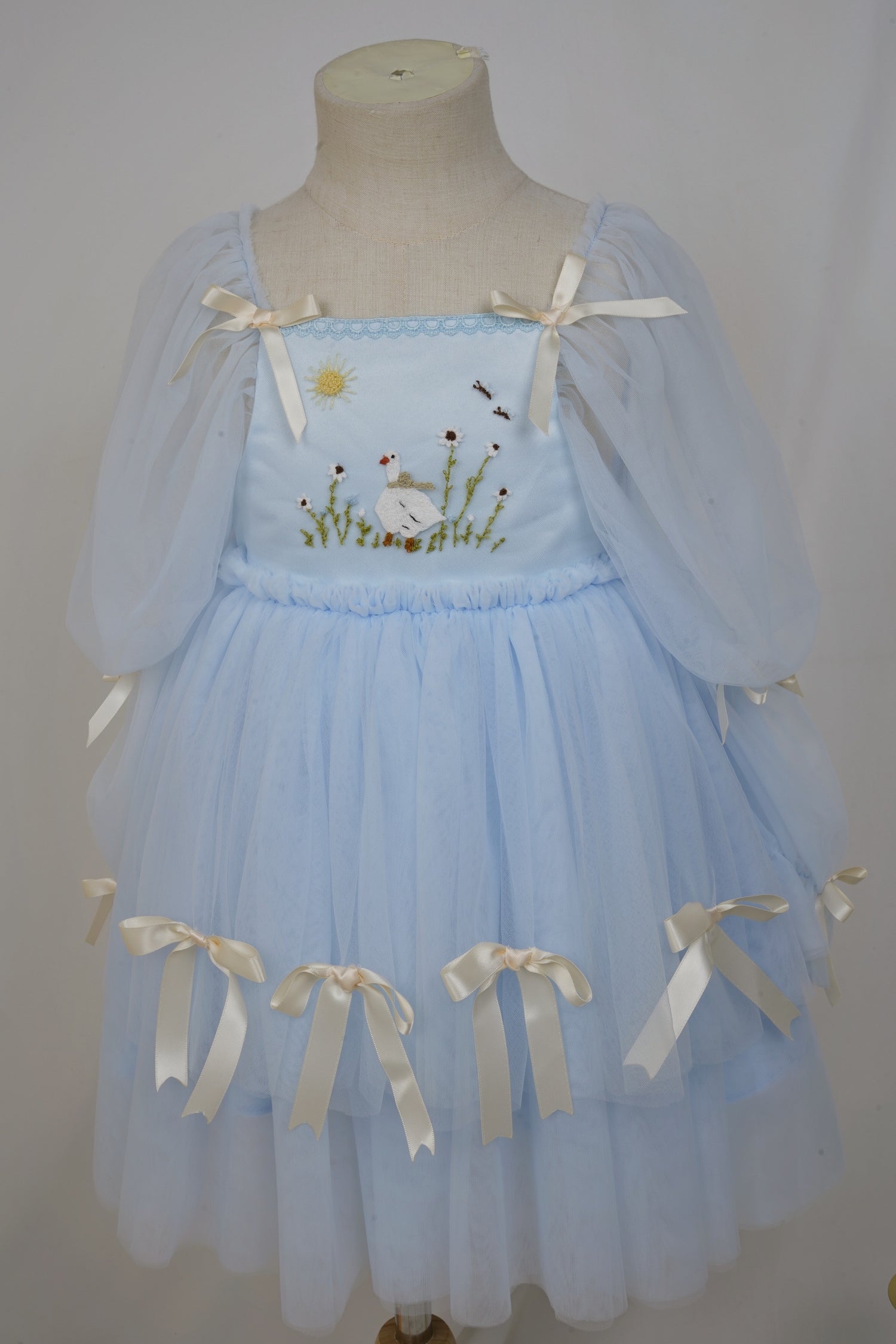 front view of handmade blue silly goose tulle birthday dress
