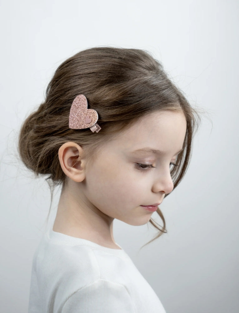 Pink heart-shaped hair clips