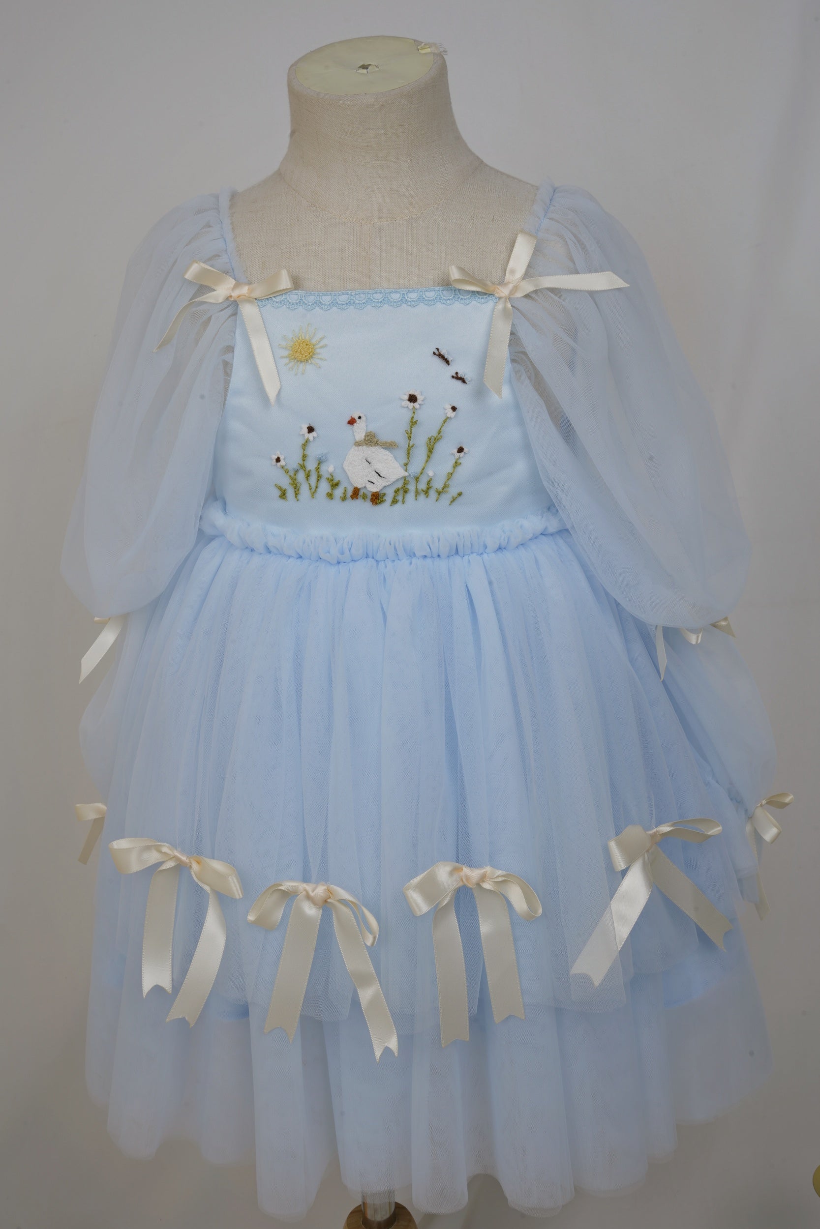 front view of handmade blue silly goose tulle birthday dress