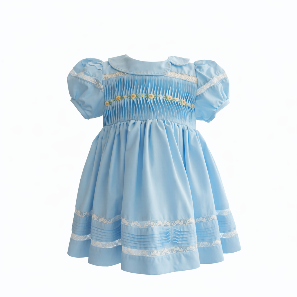 Blue baby girl dress with pintuck bodice and lace hem on hanger
